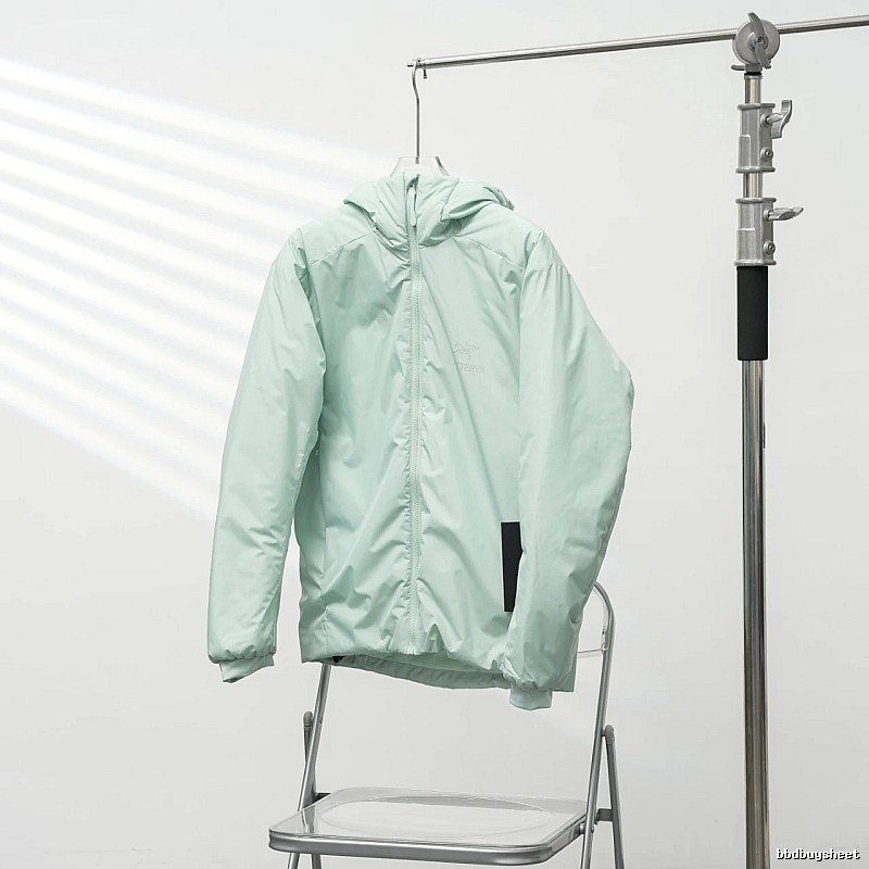 Clean Hooded Profile And Minimal Chest Branding Arc'teryx Lightweight Shell Jacket in Mint Green