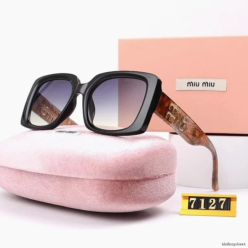 Miu Miu Gift Ready Oversized sunglasses Black Oval Sunglasses with Standout Detail
