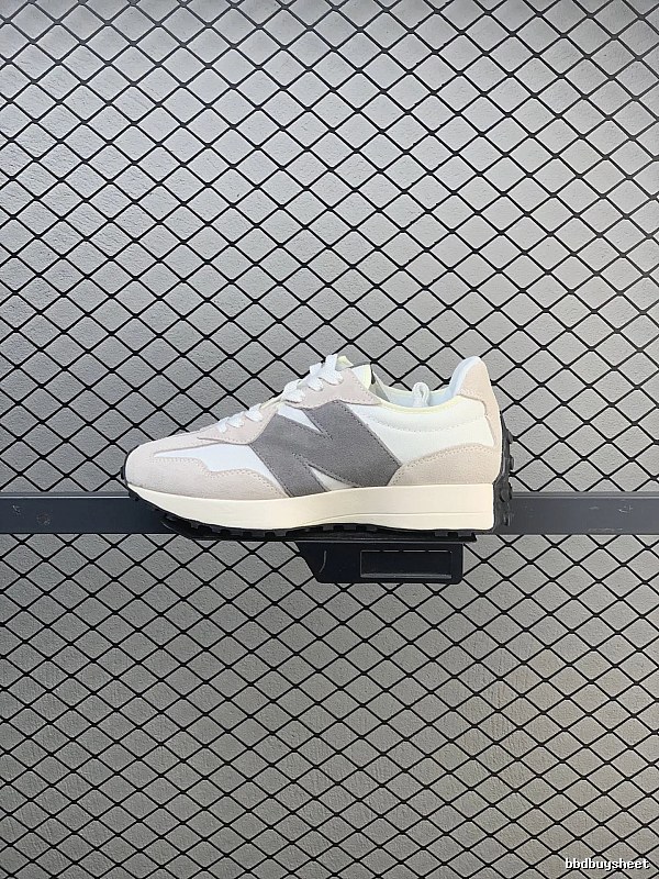 New Balance Gray Retro Runners Highlighting Road Runner Profile