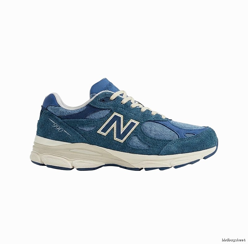 The retro-style blue shoes of the New Balance 990 series.